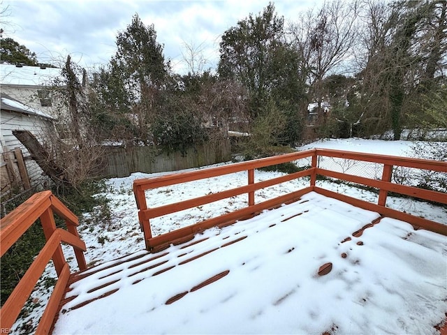 view of snow covered deck