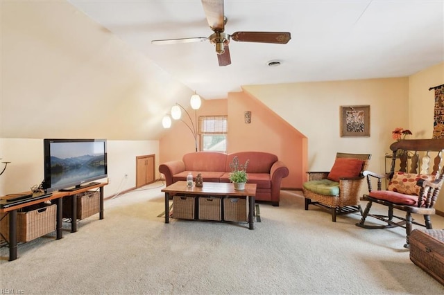 living room featuring light carpet, vaulted ceiling, and ceiling fan