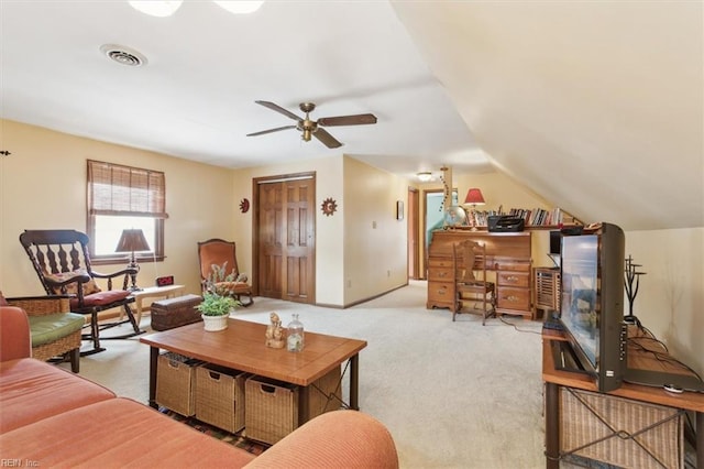 carpeted living room featuring vaulted ceiling and ceiling fan