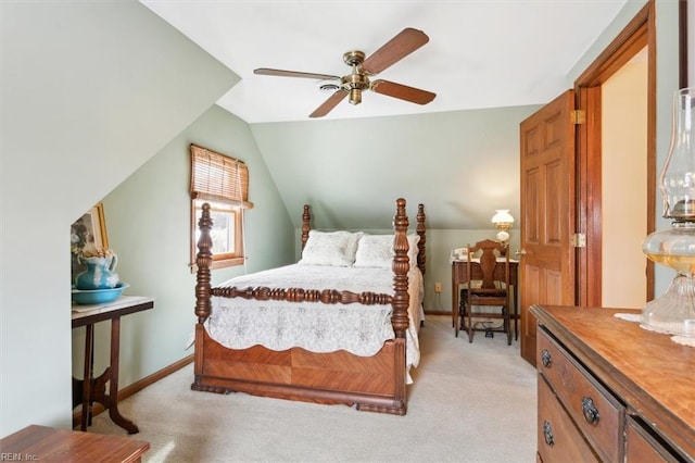 carpeted bedroom featuring lofted ceiling and ceiling fan