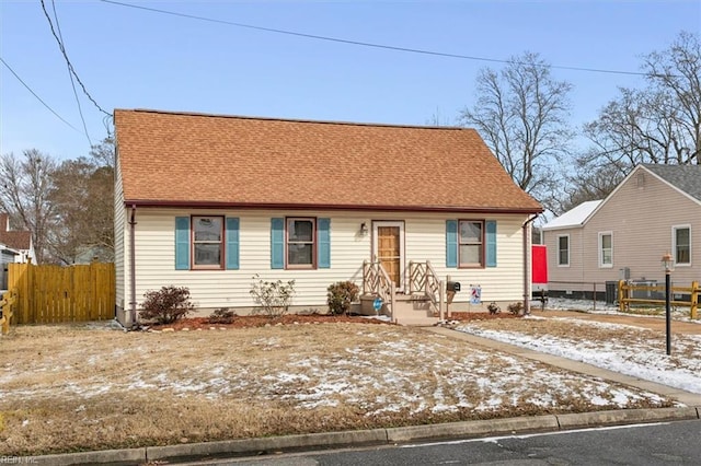 bungalow featuring central air condition unit