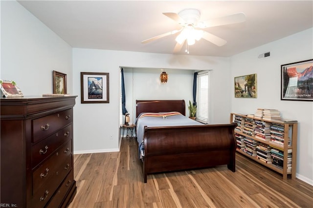 bedroom featuring light hardwood / wood-style flooring and ceiling fan