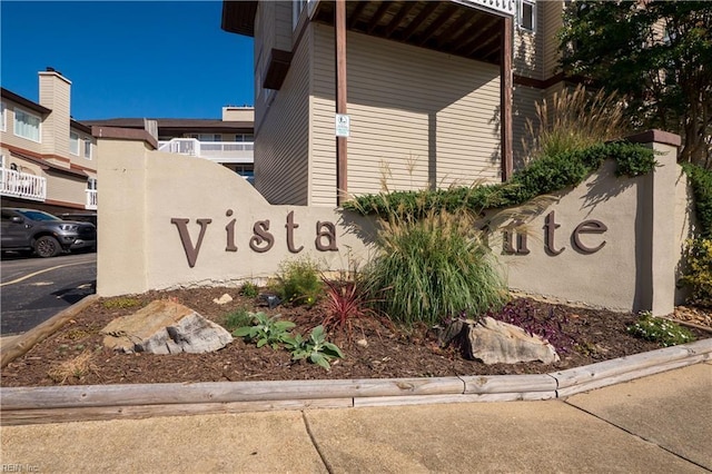 view of community sign