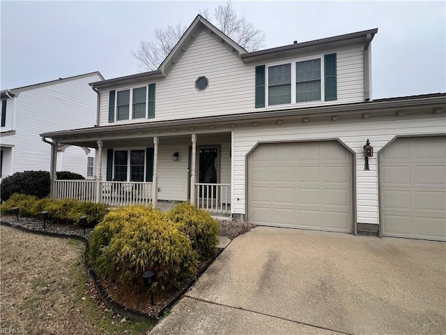 view of front of home with a garage and covered porch