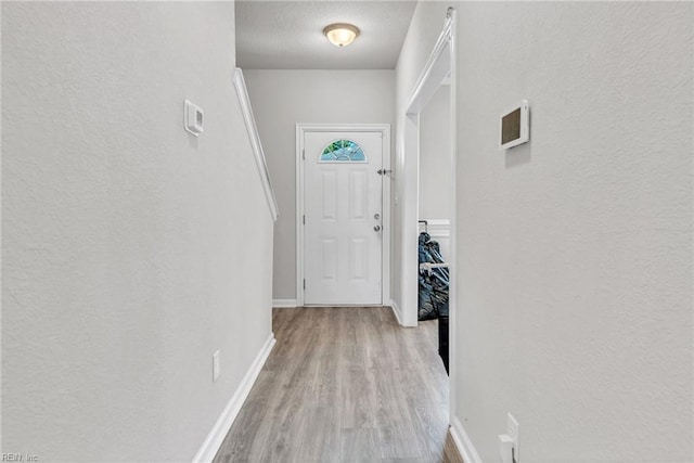 doorway featuring light wood-type flooring