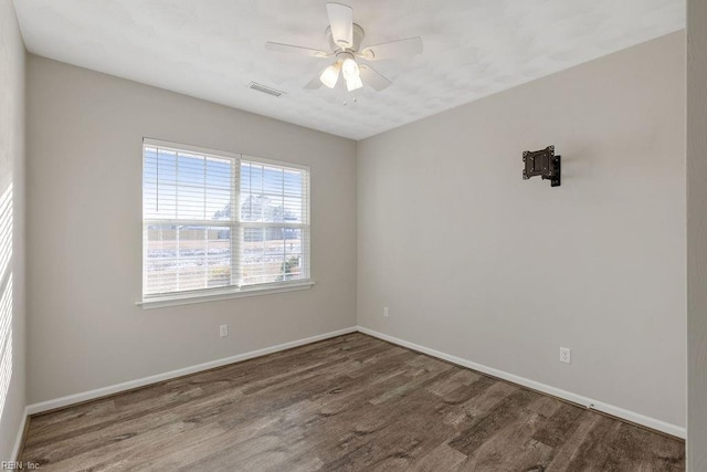 unfurnished room featuring hardwood / wood-style floors and ceiling fan