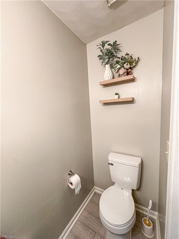 bathroom featuring toilet