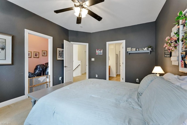 bedroom with light colored carpet and ceiling fan