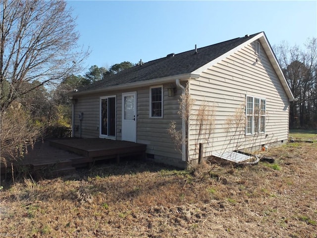 rear view of property with a deck