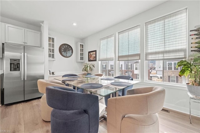 dining room featuring light hardwood / wood-style floors