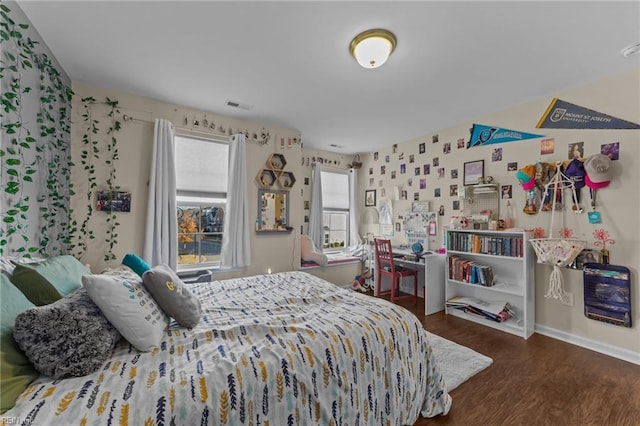 bedroom featuring dark hardwood / wood-style floors