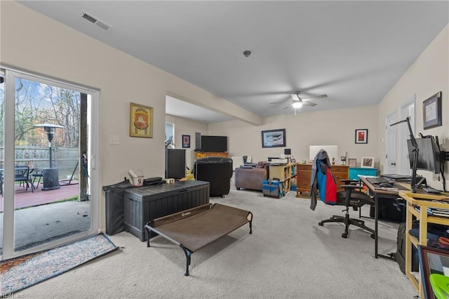 office with light colored carpet and ceiling fan