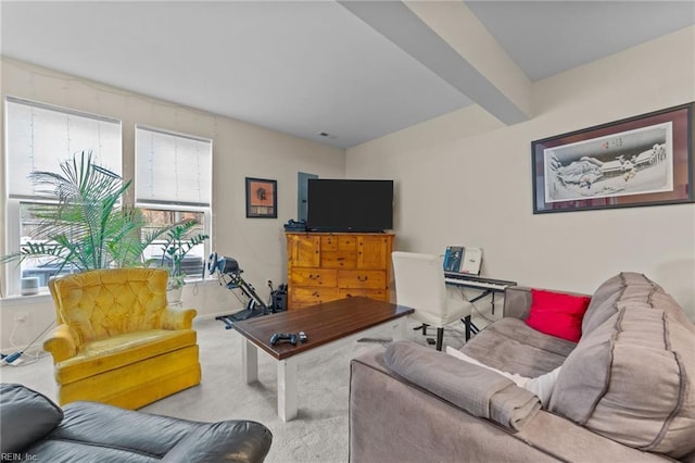 living room with beamed ceiling