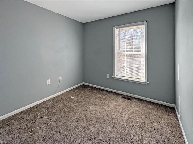 view of carpeted spare room