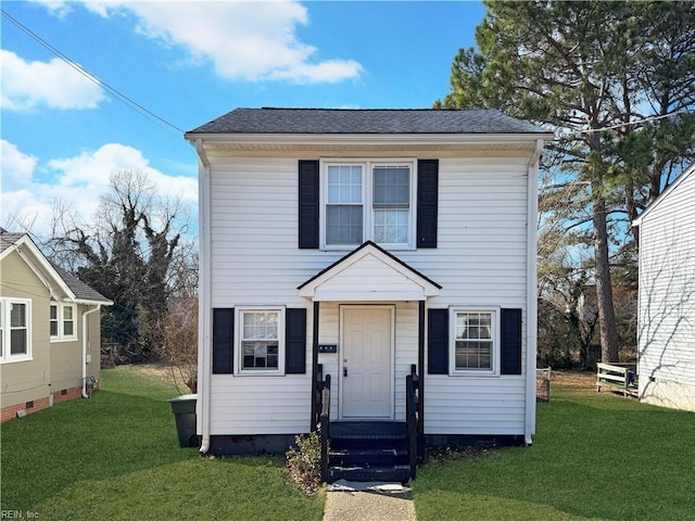 view of front of house with a front lawn