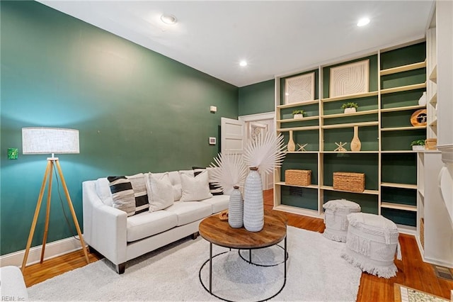 living area featuring hardwood / wood-style flooring