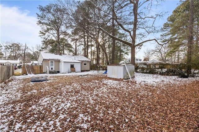 view of yard covered in snow