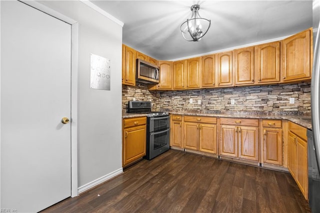 kitchen featuring dark hardwood / wood-style floors, decorative light fixtures, tasteful backsplash, dark stone countertops, and stainless steel appliances