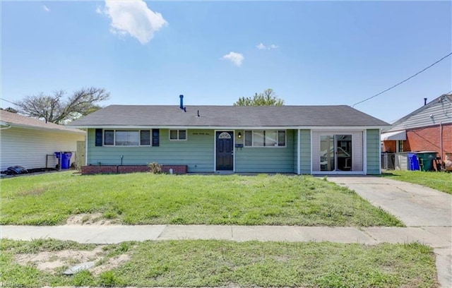 single story home with a front yard