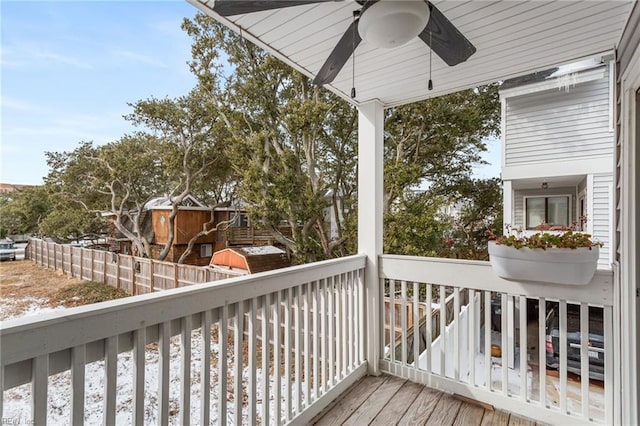 wooden deck with ceiling fan