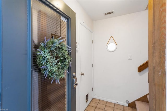 view of tiled entrance foyer