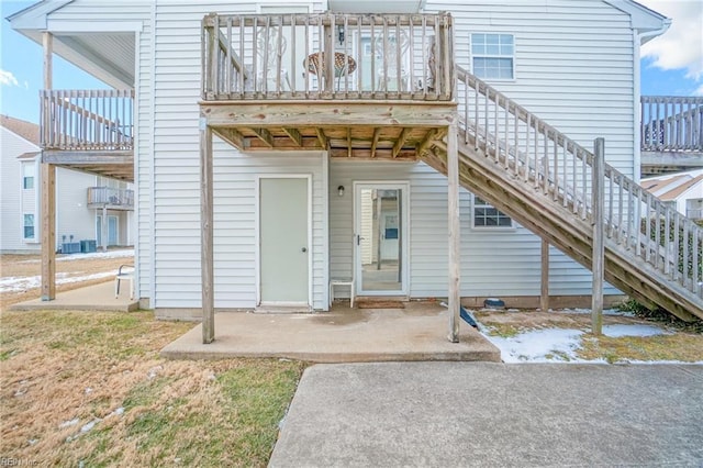 entrance to property with a patio