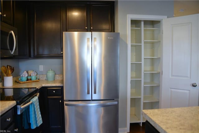 kitchen featuring appliances with stainless steel finishes