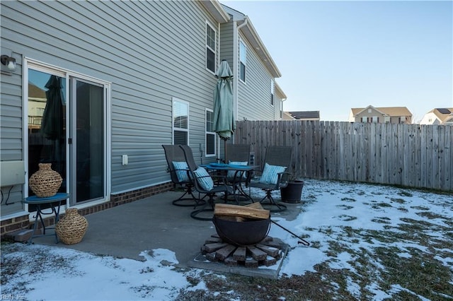 view of snow covered patio