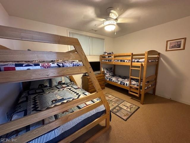 bedroom featuring carpet floors and ceiling fan