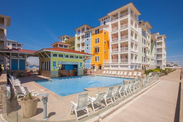 view of pool featuring a patio area