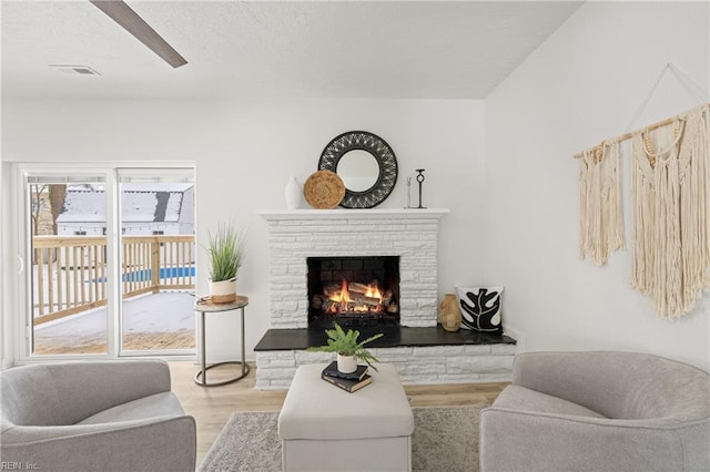 living room with light hardwood / wood-style flooring