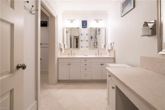 bathroom with vanity and crown molding