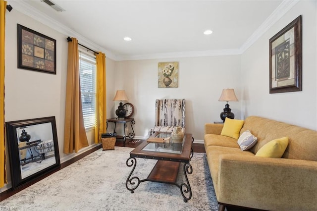 living room with hardwood / wood-style flooring and crown molding