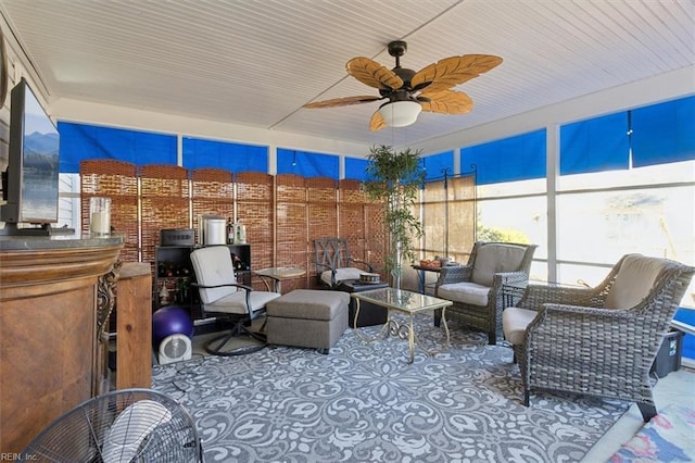 sunroom / solarium with ceiling fan