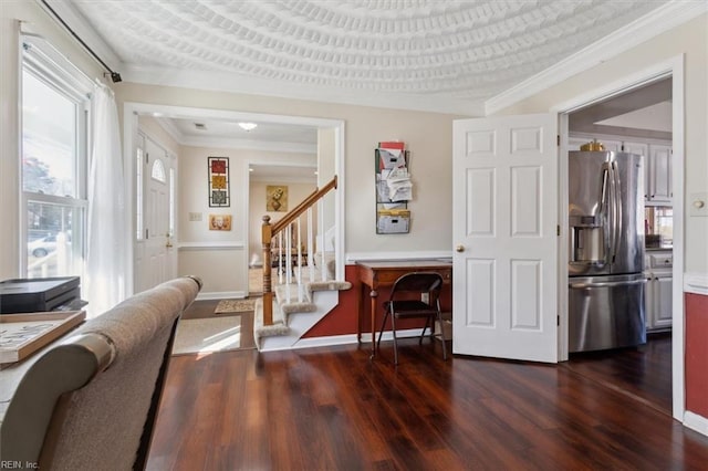 interior space with crown molding and dark hardwood / wood-style floors