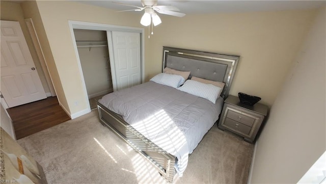 bedroom featuring ceiling fan, a closet, and carpet