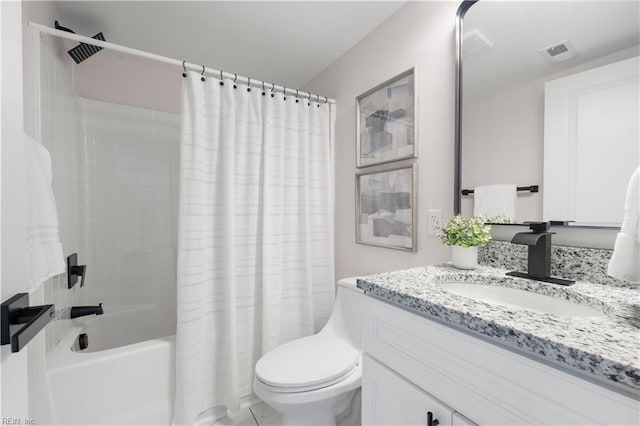 full bathroom with shower / bath combination with curtain, vanity, and toilet