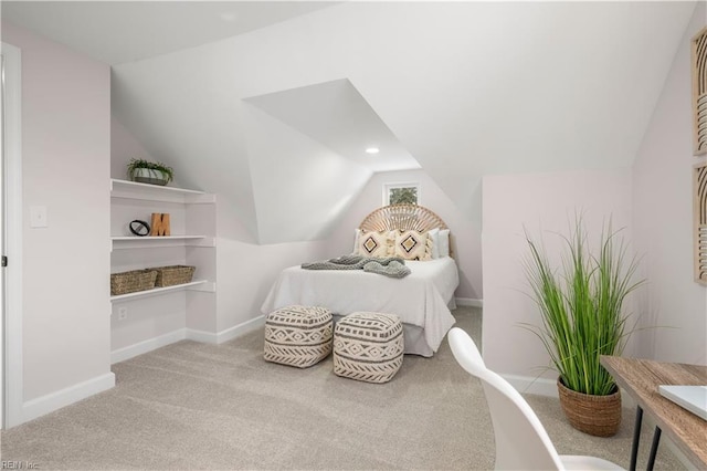 carpeted bedroom featuring vaulted ceiling