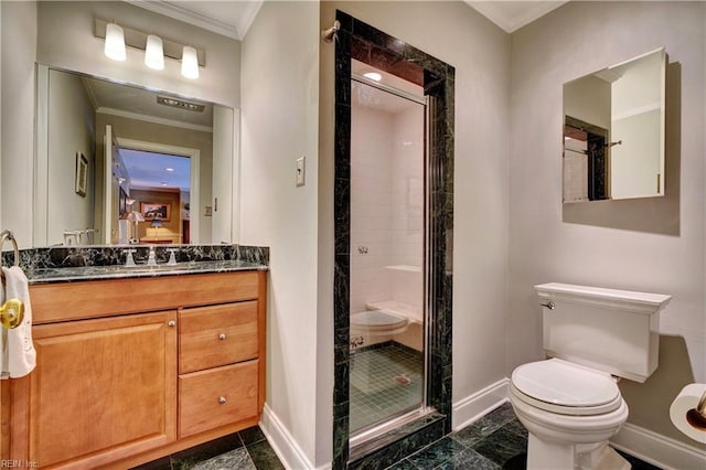 bathroom with crown molding, vanity, toilet, and a shower with door