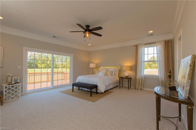 carpeted bedroom with access to exterior, ornamental molding, and ceiling fan