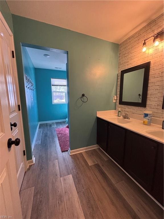 bathroom featuring hardwood / wood-style flooring and vanity