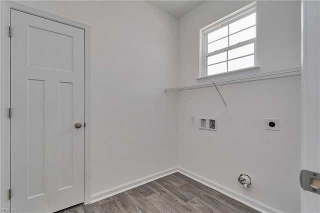 laundry area with hookup for a washing machine, hardwood / wood-style flooring, and hookup for an electric dryer