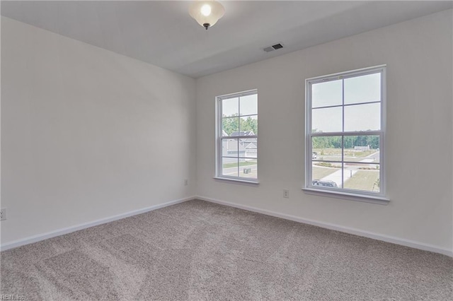 unfurnished room with carpet