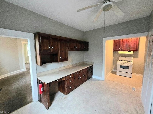 kitchen with ceiling fan and stove