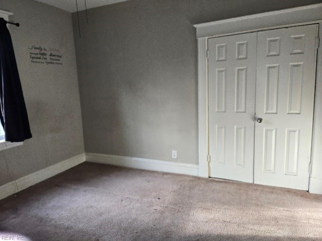 spare room with carpet floors