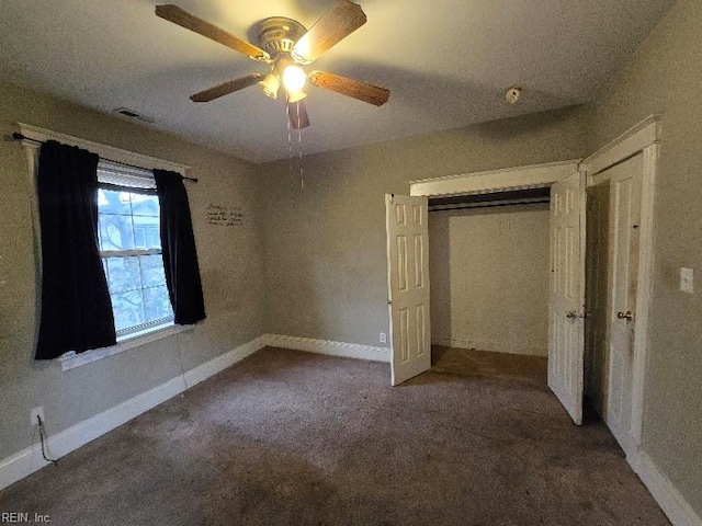 unfurnished bedroom featuring a closet, ceiling fan, and carpet