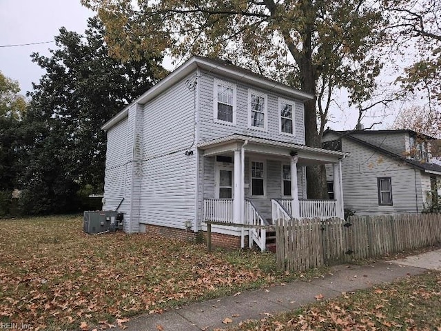 view of property with central AC and covered porch