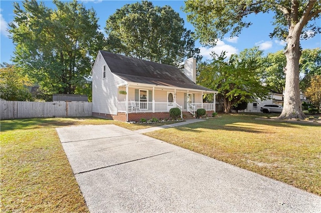 view of front of house featuring a porch and a front yard