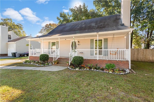 view of front of property with a porch and a front yard