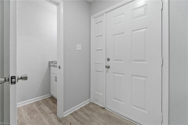 doorway to outside with light hardwood / wood-style flooring